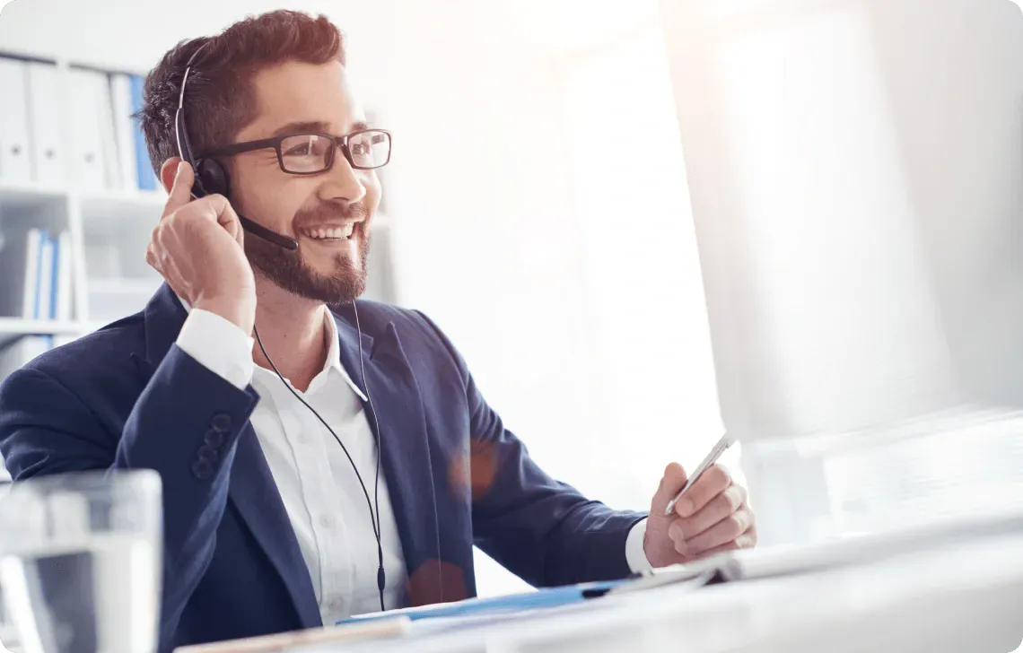 A trader using Smartphone to contact Trade-zenfy
